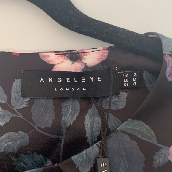 NWT Angel Eye London dress. Size medium. Comfy and cute. - Picture 3 of 5